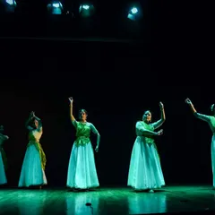 My ensemble performing a group choreography. The coordinated costumes and synchronized poses demonstrate the unity and precision required for a large-scale Kathak production.