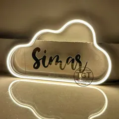The reflection on the floor shows the beautiful glow of the neon light. These signs are easy to hang and plug in.