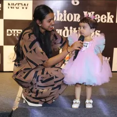 I believe talent has no age limit. Here I am with one of our youngest participants at the auditions. We make sure even our tiniest contestants feel comfortable and confident.