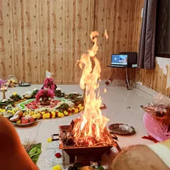 The sacred fire of the Surya Homa, a powerful ritual performed to invoke the energy of the sun and bring health and vigor to all participants.