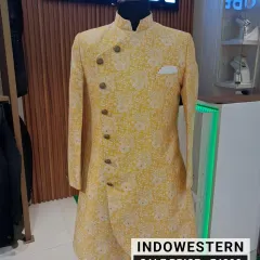 Make a bold entrance with this vibrant yellow printed Indo-western sherwani. It's a unique, eye-catching piece that guarantees you'll stand out. This designer outfit is an absolute steal at a sale price of ₹4000.