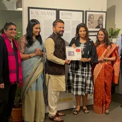 Receiving the award from the honorable panel at the Kamalayan Bajaj Art Gallery in Mumbai.