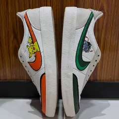 This top-down view highlights the distinct design on each shoe. The orange and green color schemes for Pikachu and Bulbasaur are clearly visible, making this a truly one-of-a-kind pair of custom kicks.