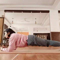 Holding Phalakasana, or the plank pose, is a powerful way to build core strength. Nurturing your body with practices like this is the first step to nurturing your mind and achieving balance.