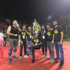 Posing with the trophies. A proud moment for Team Dynamic, showcasing the results of months of hard work, intelligence, and teamwork.