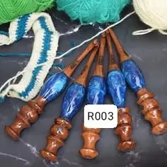 This set of blue resin and wood hooks shows the beautiful marbling effect in the handles. Each hook is a small piece of art, making your crafting time feel extra special.