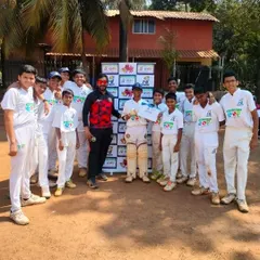 Celebrating a player's birthday with his teammates after a practice session. Building a strong team bond is just as important as training.