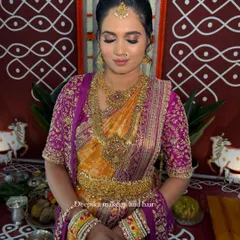 Another shot from the housewarming, set against a traditional backdrop, showing the complete look.