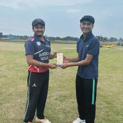 A young player receiving an award, highlighting our focus on nurturing talent from a young age.