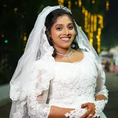 A portrait of my lovely Christian bride. Her smile says it all. I gave her a fresh, radiant makeup look with a simple tiara and veil.