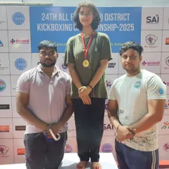 A female athlete from our academy receives her gold medal at the Faridabad District Championship. We train our athletes to compete and win at every level.