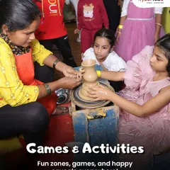 A close-up of our popular pottery workshop where a child learns to use a potter's wheel with guidance from an instructor. We believe in letting kids get their hands dirty to create something beautiful.