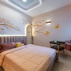 A room that feels like spring all year round. The cherry blossom mural wraps around the room like a gentle hug, while the soft ceiling glow makes you forget where the walls end and the sky begins.