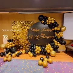 Another perspective of the impressive 95th birthday decoration, showcasing the scale of the balloon arrangement.
