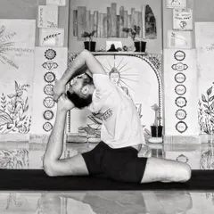 Eka Pada Rajakapotasana, the One-Legged King Pigeon Pose. This image captures the deep backbend and hip-opening aspects of the asana, showcasing advanced flexibility and grace.
