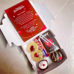 We helped Team Pumpkin celebrate Valentine's Day at work with these fun mini hampers. Each box included a personalized card and a mix of sweet treats to make their team feel special.