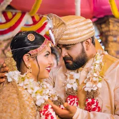 A candid moment filled with love. My bridal makeup was soft yet defined, ensuring it looked beautiful in professionally captured, emotional moments like this.