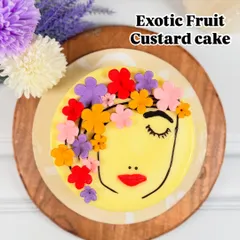 Our Exotic Fruit Custard cake, part of the Women's Day collection, features a light custard base topped with a beautiful, handcrafted floral face design. It's a tribute to artistry and flavour.