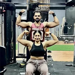 My wife and I, a team in life and in fitness. We believe that having a strong support system is key, and I bring that same supportive energy to every one of my online personal training clients.
