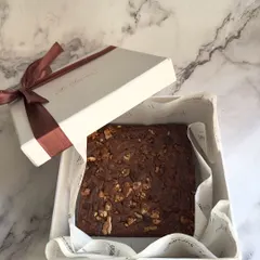 A classic choice for Diwali gifting, this box contains my signature fudgy walnut brownie. It's a simple yet elegant gift that is always appreciated for its rich flavor and premium quality.