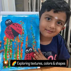 This mixed-media ladybug artwork is a perfect example of how we explore textures, colors, and shapes. The combination of painting and paper craft creates a wonderful 3D effect.
