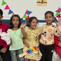 A snapshot of pure joy with my little friends. These happy, waving faces capture the precious memories and friendships we create at Kalarang Club.
