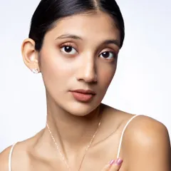 Clean, minimalist, and elegant. This shot for a western jewelry brand features a delicate swan pendant necklace, captured with soft lighting to emphasize its simple beauty.