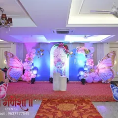 An elegant butterfly theme for a little princess's birthday. I used large, detailed butterfly wing props, pastel balloon garlands, and soft lighting to create this magical stage.