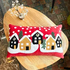 Jingle bell rock your home decor with our fun and festive Christmas cushion covers. This design features a snowy village scene, made with soft, high-quality materials.