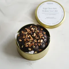 My healthy and delicious Ragi Chocolate Walnut Cake in its reusable tin, a thoughtful and guilt-free gift for your sibling.