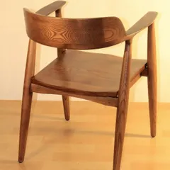 A dining chair I am particularly proud of, inspired by classic mid-century modern design. Made from solid teak wood with a beautiful grain and finished with a melamine polish, this chair is both a functional seat and a piece of art.
