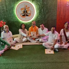 Sharing a happy moment with students after a fulfilling session. The studio is not just a place to practice yoga, it is a community where we support each other's wellness journeys.