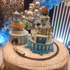 This grand, three-tiered Boss Baby theme cake is a perfect example of how I bring big party themes to life. Complete with a miniature train track and detailed fondant characters, it's designed to be the showstopper at any large celebration.
