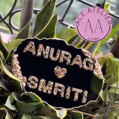 This black and gold geode resin nameplate for Anurag and Smriti offers a bold and elegant alternative for your home's entrance.