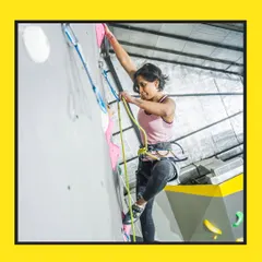 A shot of a climber focused and ready on our lead wall. This is an invitation to all adventurers to gather their tribe and come for an exhilarating climbing experience with us.