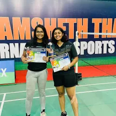 Celebrating Prishita Sinha's double victory at the Yonex-Sunrise Raigad District Championship. She secured first place in both Senior Women's Doubles and Senior Mixed Doubles.