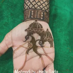 The finished peacock and doli design, now filled with intricate details and shading. This transformation from a simple outline to a detailed piece shows the depth and texture I bring to my work.