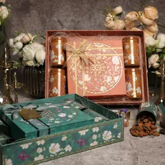A set of two intricately designed gift boxes, one for dry fruits and one for other goodies. Offering coordinated sets is a great upselling strategy that we discuss in the workshop.