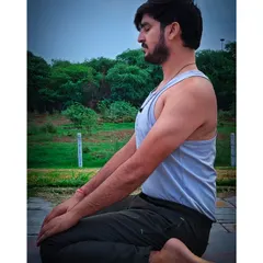 Here I am in Virasana, or Hero Pose. This is a great meditative pose that also improves digestion and helps increase flexibility in the knees and ankles.