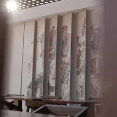 A view of the Japanese art mural inside the Ebisu dining space. The artwork was printed on folding panels, adding an authentic and artistic element to the pop-up's interior design.
