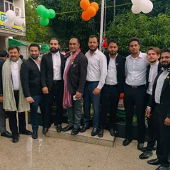 With a group of esteemed colleagues. The legal profession is built on relationships and mutual respect.