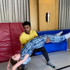 Building core strength and flexibility with a coach's support. Our gymnastics parties are a fantastic way for kids to explore their physical abilities in a safe setting.