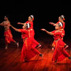 My senior disciples and I in a dynamic movement from a group choreography. I train my students to perform with precision and shared energy, creating a cohesive and impactful stage presence.