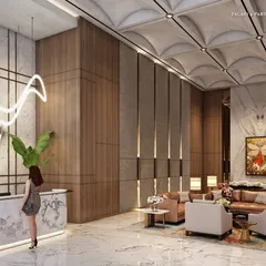 The reception lobby of a luxury South Mumbai residence, where a vaulted ceiling and wood-paneled walls create a warm and elegant welcome. A sculptural light fixture and curated art add to the atmosphere of refined sophistication.