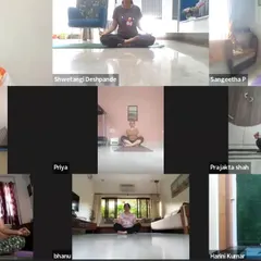 A screenshot from our 7 AM online yoga session, where participants from different locations connect to practice meditation together. This image captures the calm and focus that can be achieved in a virtual group setting.