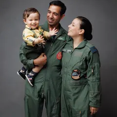 A candid moment during the Airforce family's photoshoot. The genuine interaction and laughter between them make this portrait extra special.