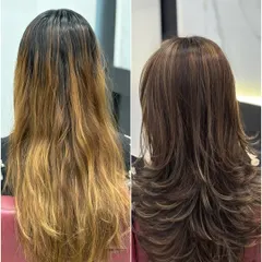 A view from the back shows the full effect of this cut and color transformation. The new layers remove the weight from her old style and allow the new, richer hair color to show its dimension.