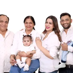 A multi-generational family portrait, including grandparents, parents, and children. We create memories for the entire family.