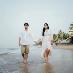 A simple, beautiful walk along the shoreline. These natural, candid moments are the heart of a relaxed beach pre-wedding shoot.