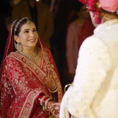 A candid moment of love during the wedding ceremony. My bride looks radiant and happy, with her makeup holding up perfectly through all the emotions of the day.